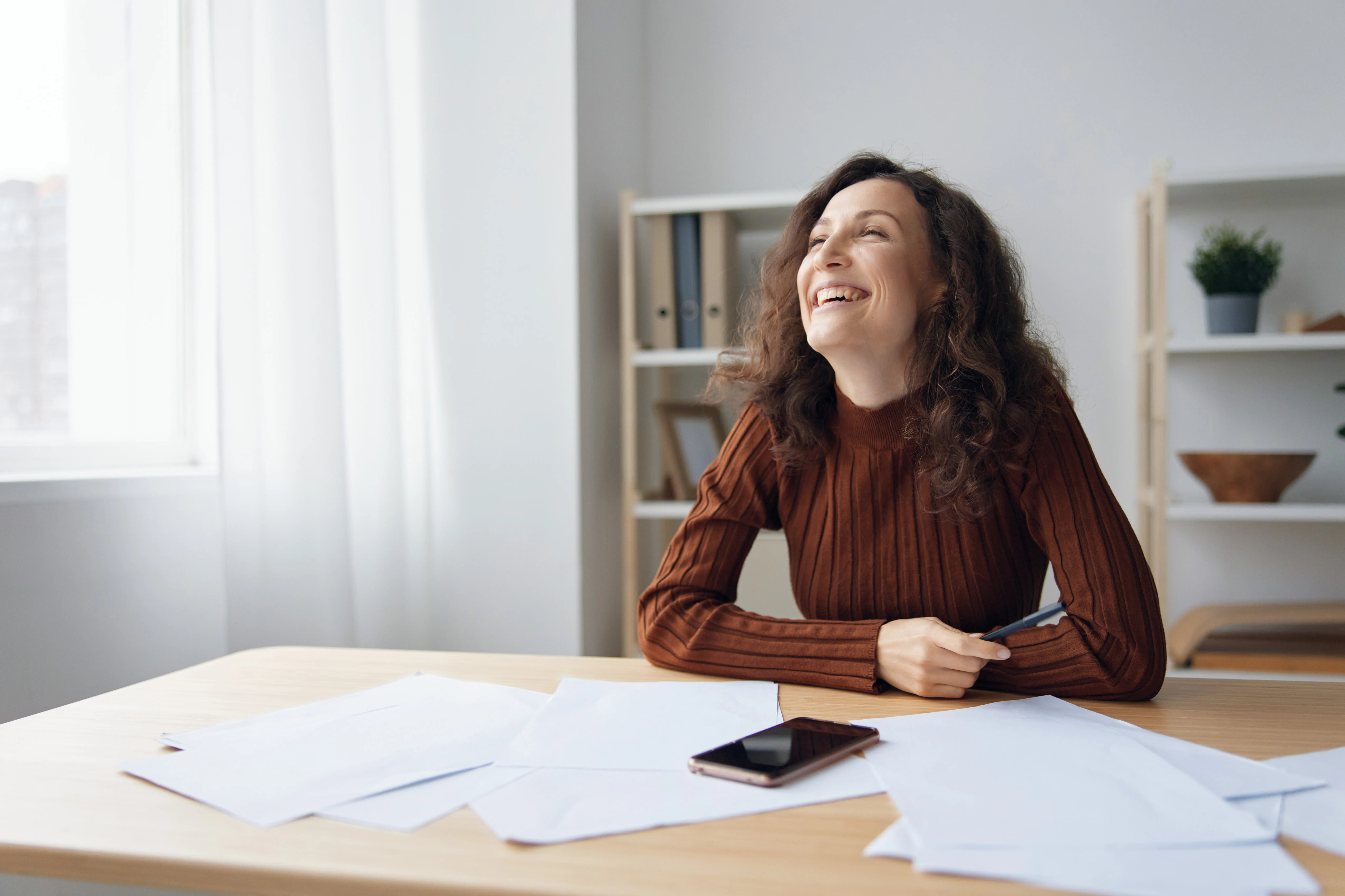 Como quitar dívidas através do empréstimo com garantia de imóvel e reduzir juros