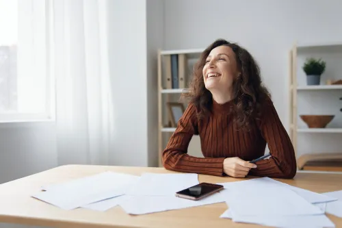 Como quitar dívidas através do empréstimo com garantia de imóvel e reduzir juros